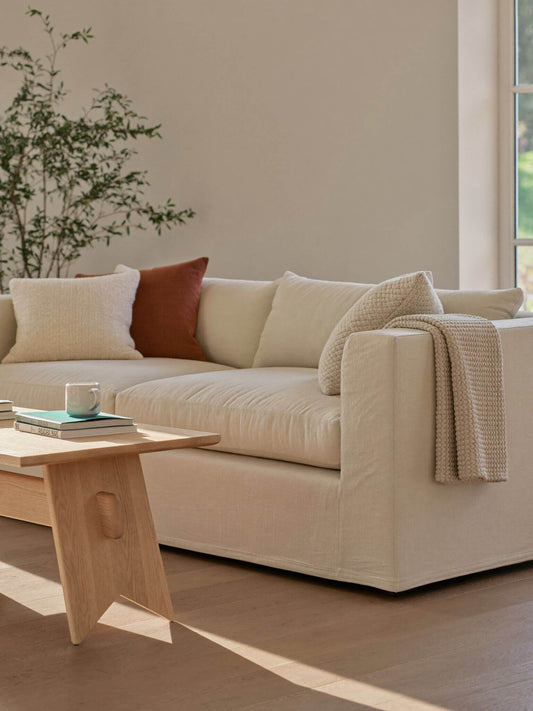 Living room with a covered sofa
